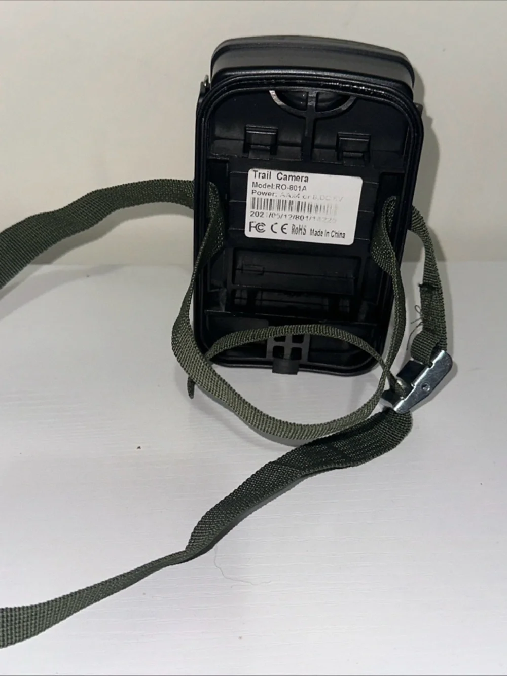 Source Unknown Camouflage Trail Camera with Dark Green Strap
